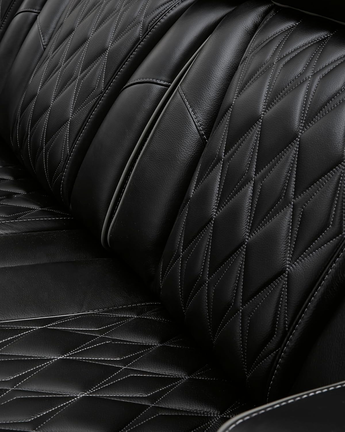 Signature Design by Ashley Boyington Modern Leather Match Power Reclining Loveseat with Console, Adjustable Headrest, Massage, Heated Seat and LED Lights, Black